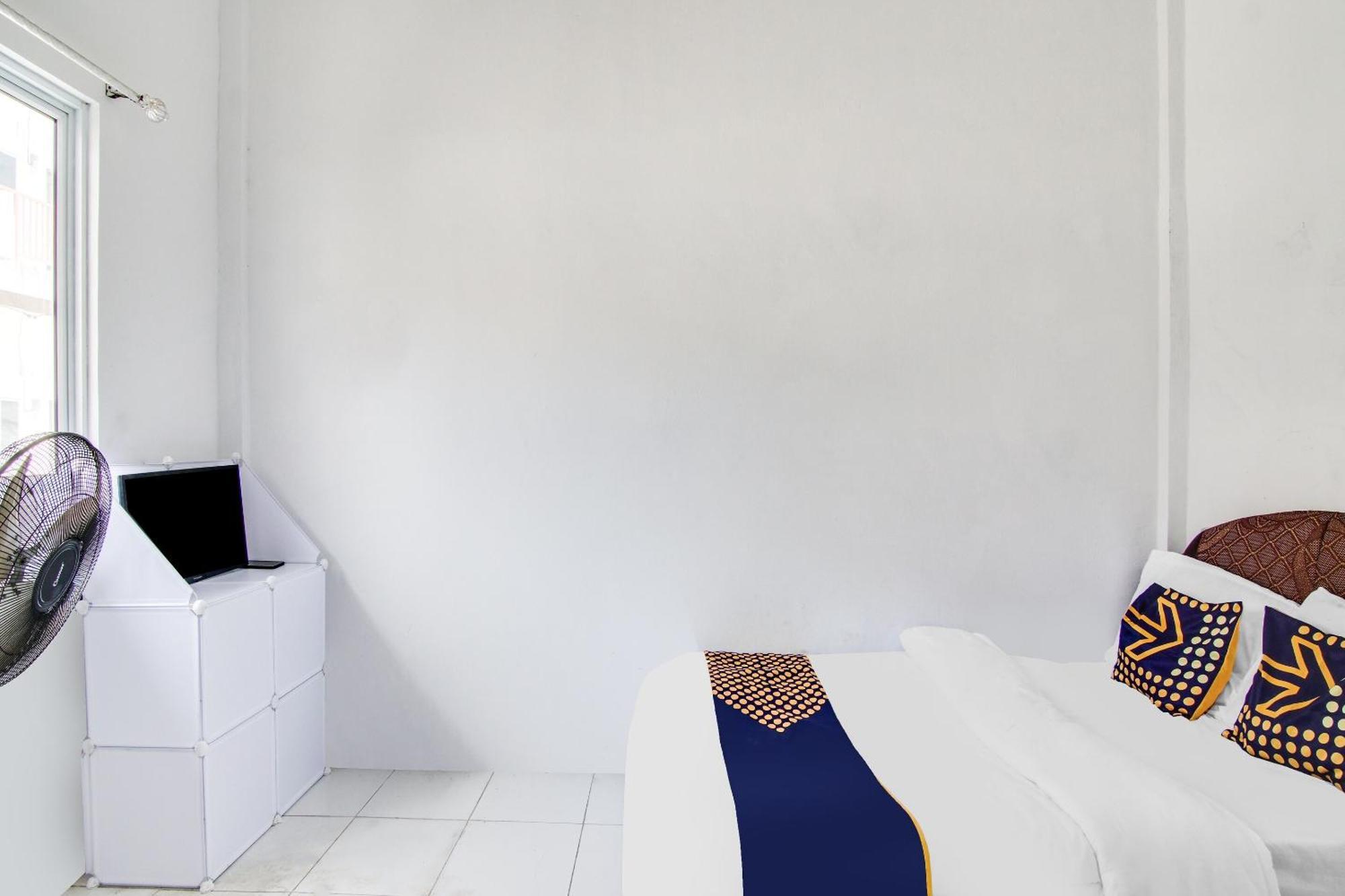 Spot On 91858 Raja Syariah Hotel